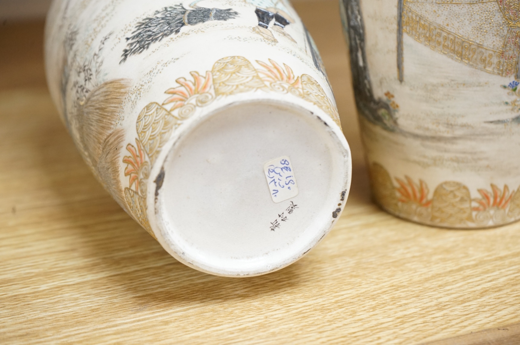 A pair of Japanese Satsuma vases,Meiji period, signed, 23cm